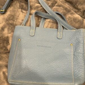 Portland leather mini crossbody purse. Blue color with zip top. Never used.